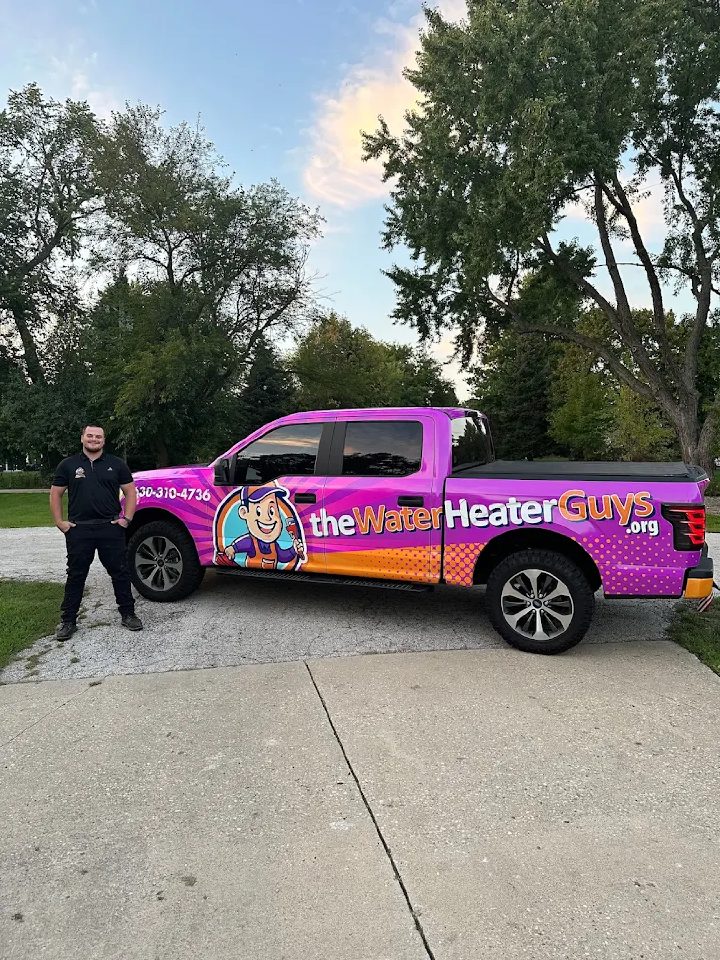 The Water Heater Guys branded truck parked on a residential Campton Hills street